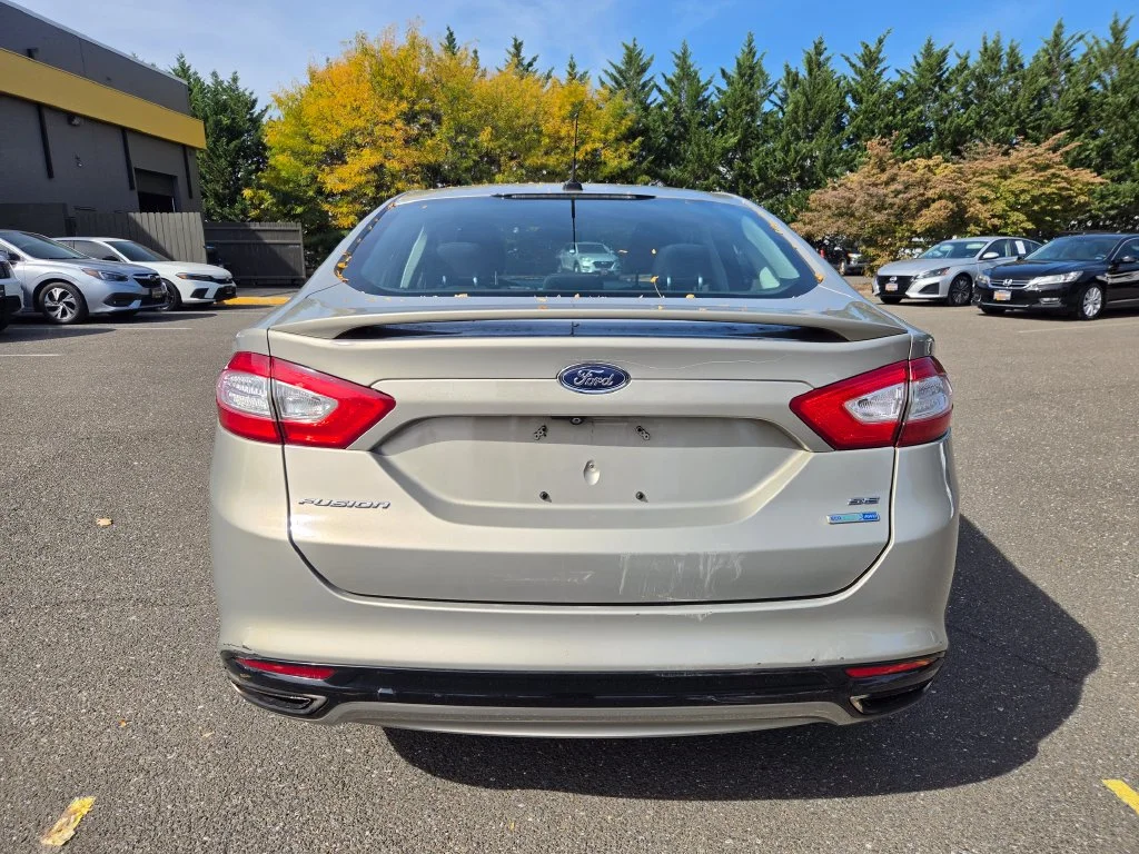 Used 2015 Gold Ford SE image 6