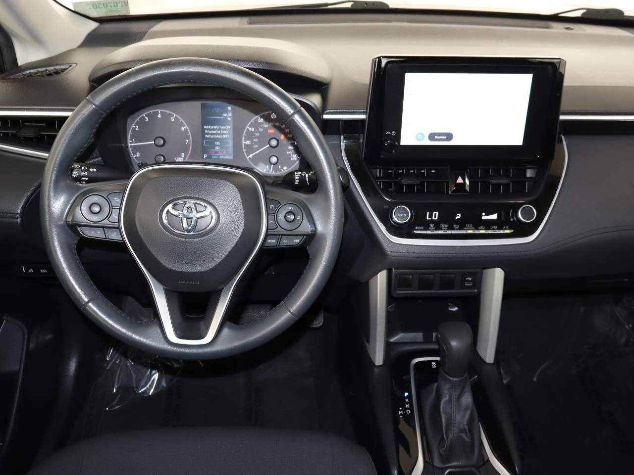 Used 2024 Barcelona Red Metallic Toyota LE image 10