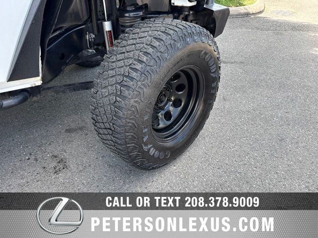Used 2013 White Jeep Unlimited Sport image 11