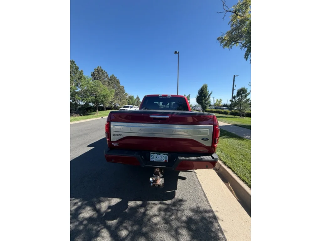 Used 2015 Ruby Red Metallic Tinted Clearcoat Ford Platinum image 4