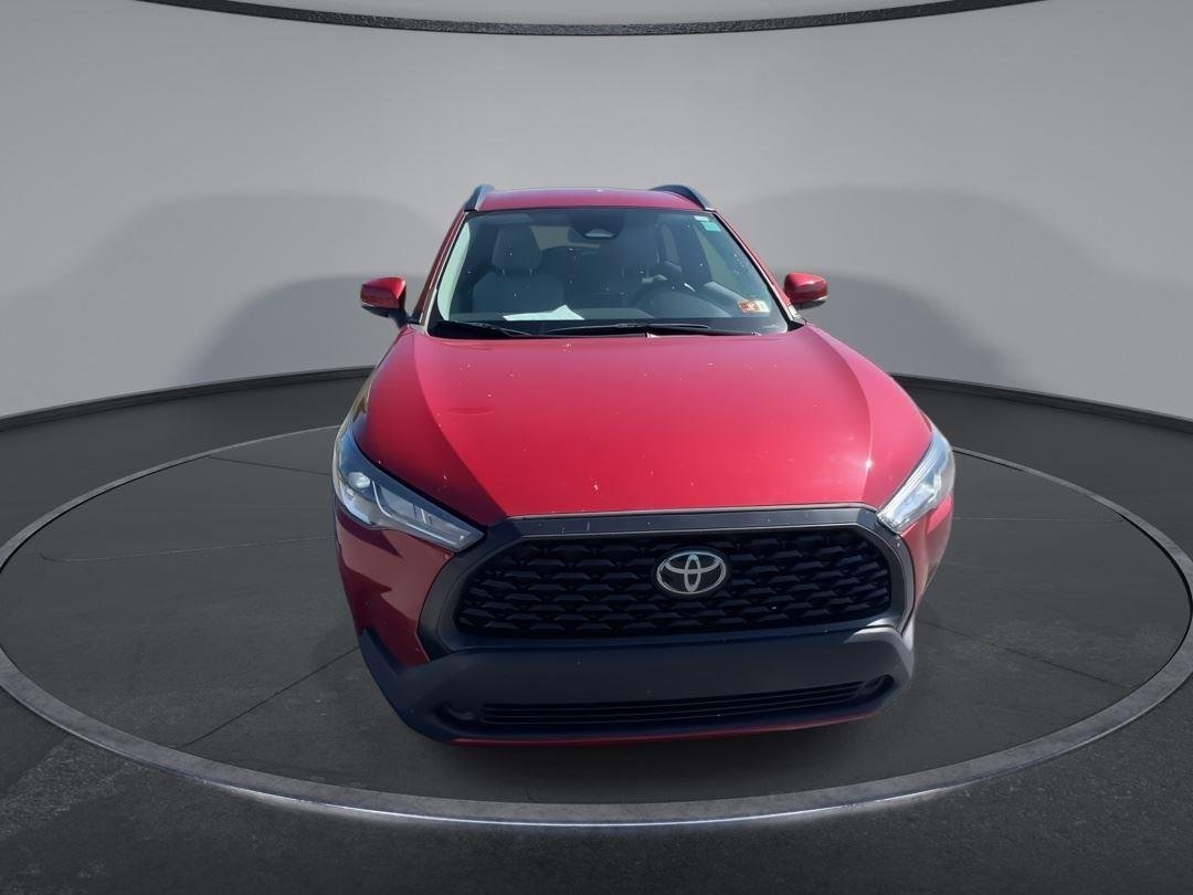 Used 2023 Barcelona Red Metallic Toyota LE image 3
