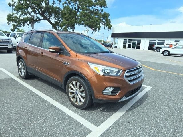 Used 2017 Ford Escape Titanium with VIN 1FMCU0J91HUD16179 for sale in Brooksville, FL