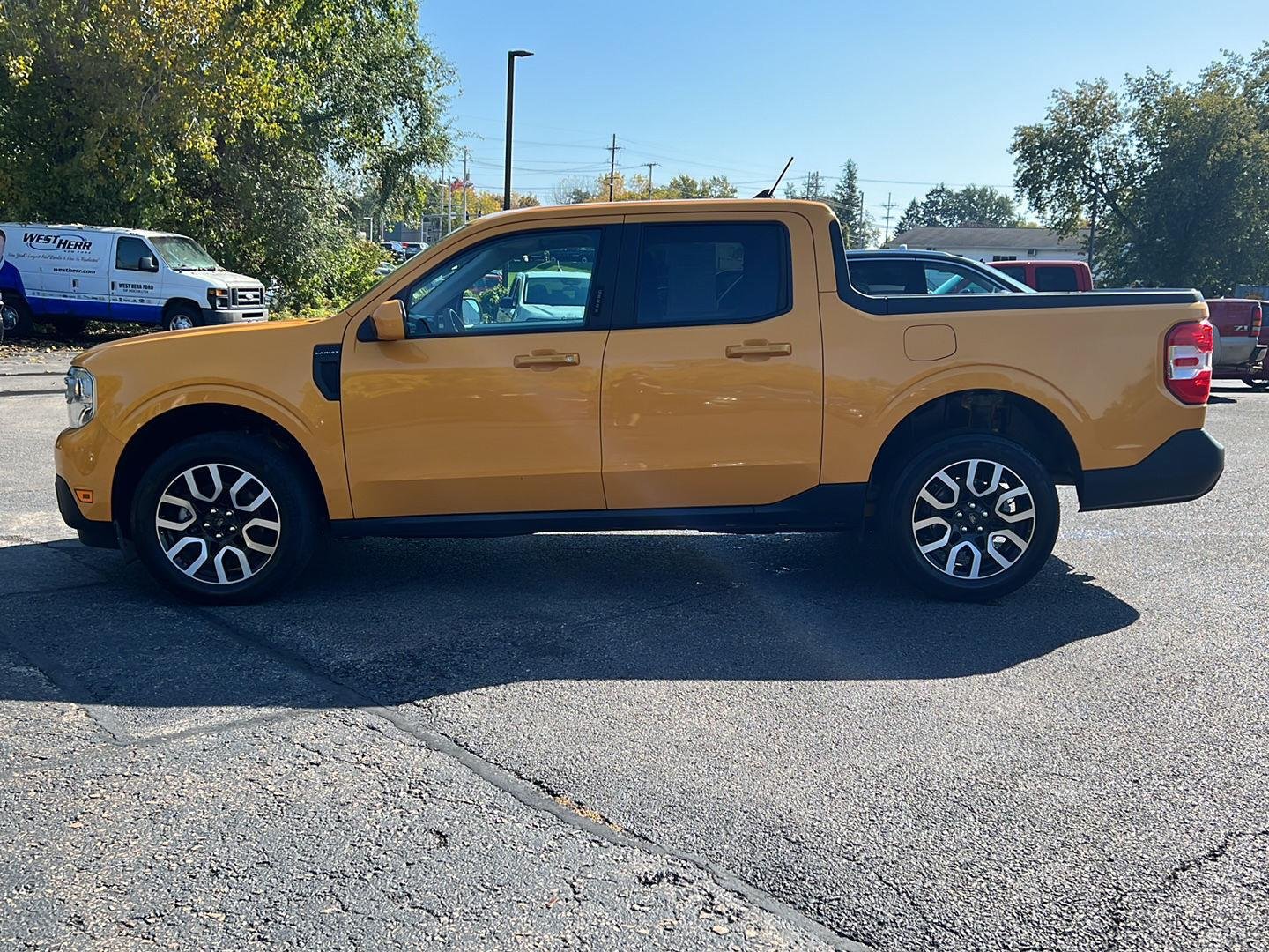 Used 2023 Cyber Orange Metallic Tri-Coat Ford LARIAT image 19