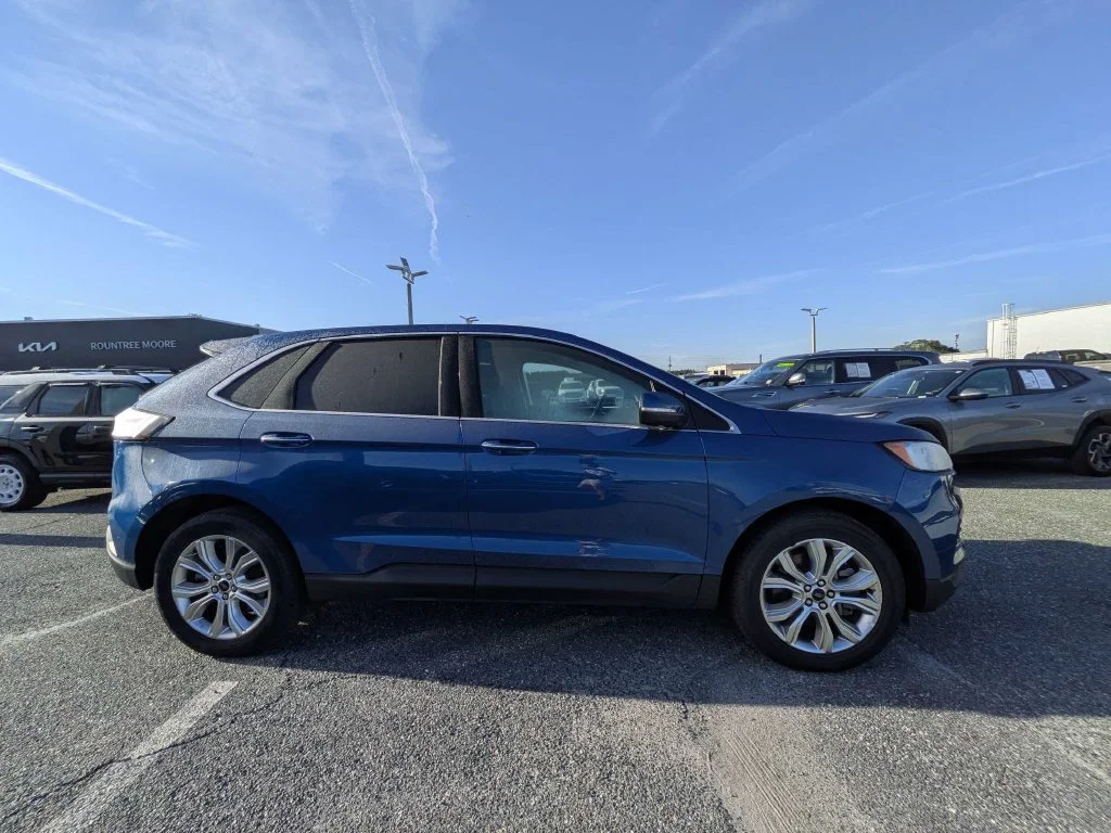 Certified Used 2024 Blue Metallic Ford Titanium image 2