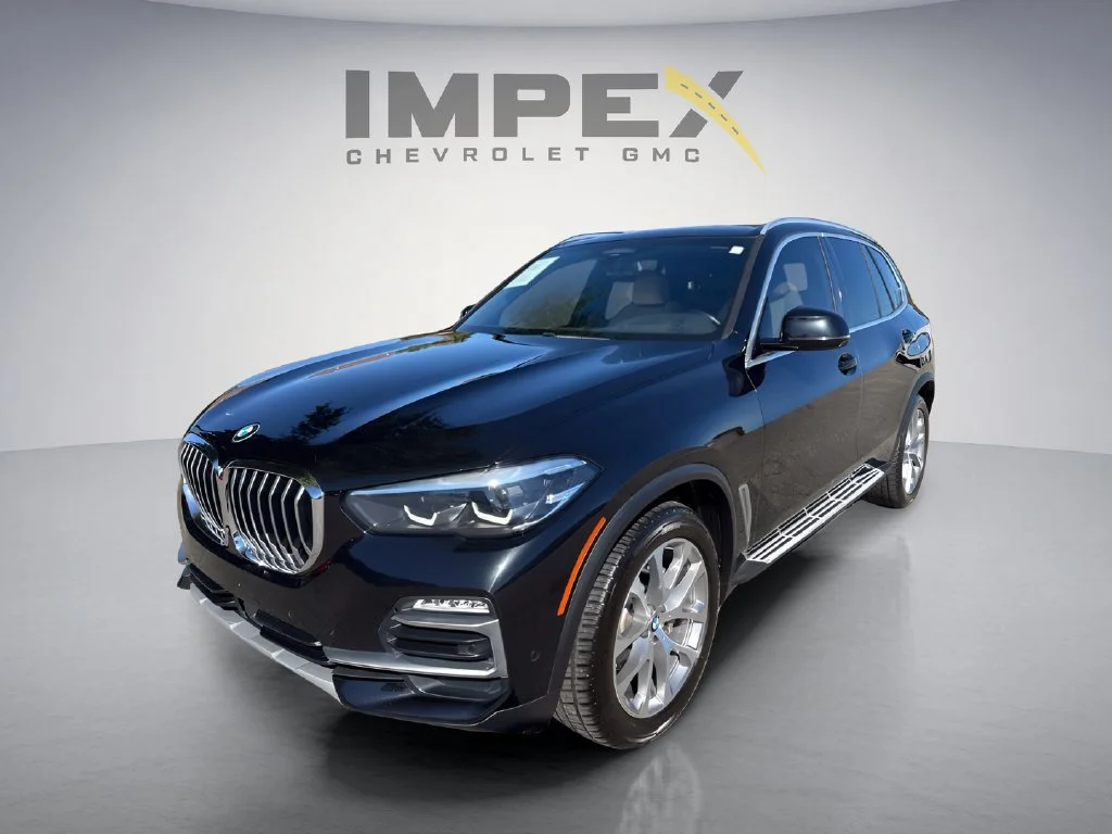 Used 2021 Black BMW sDrive40i image 1