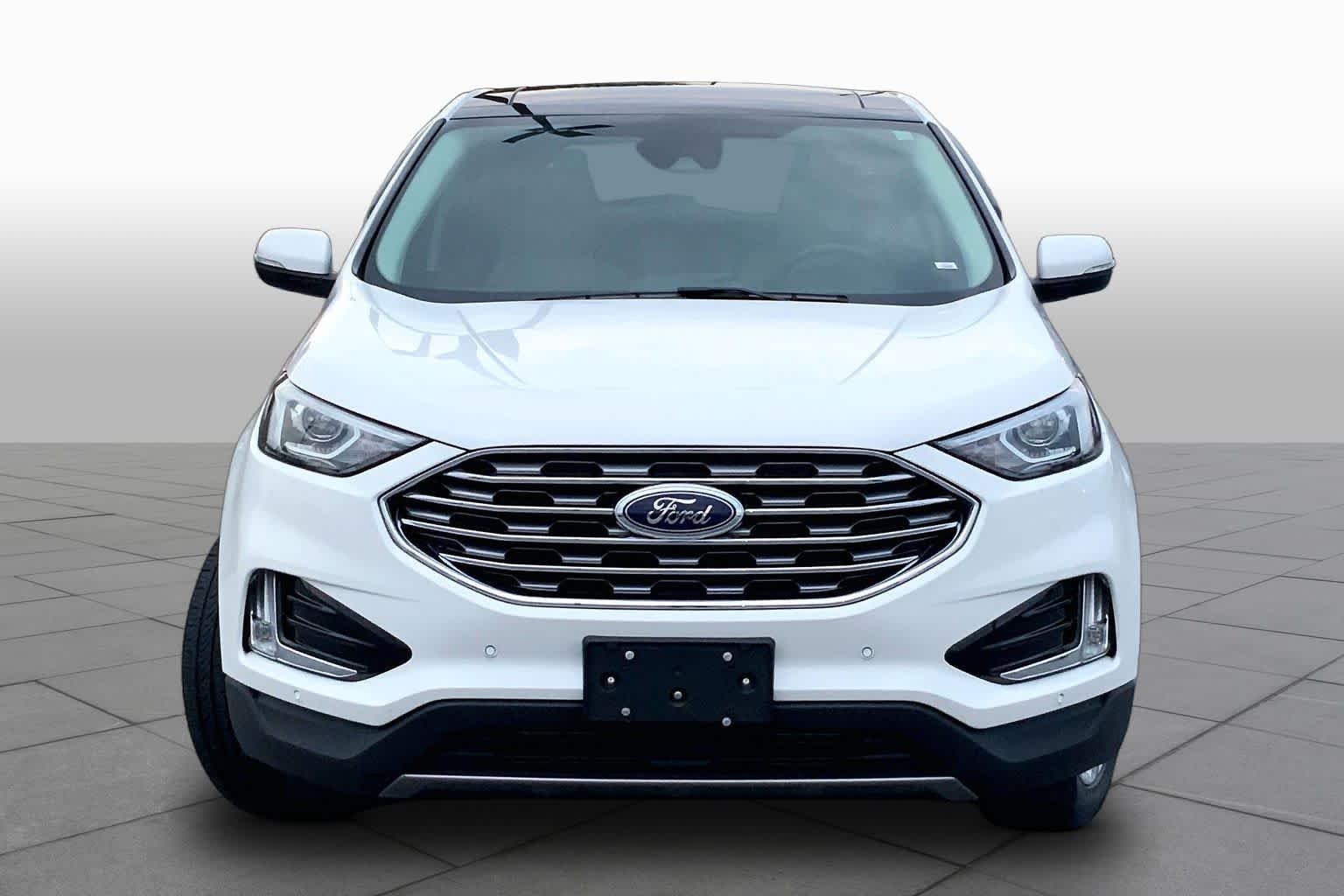 Used 2022 Star White Metallic Tri-Coat Ford Titanium image 4
