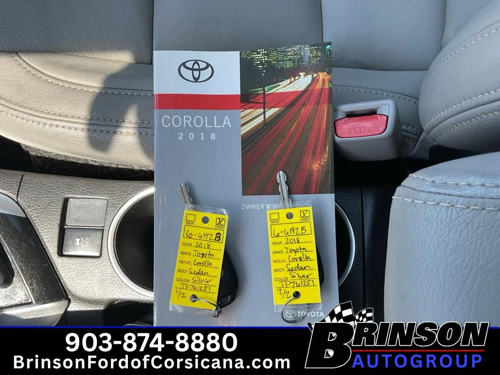Used 2018 Classic Silver Metallic Toyota LE image 31