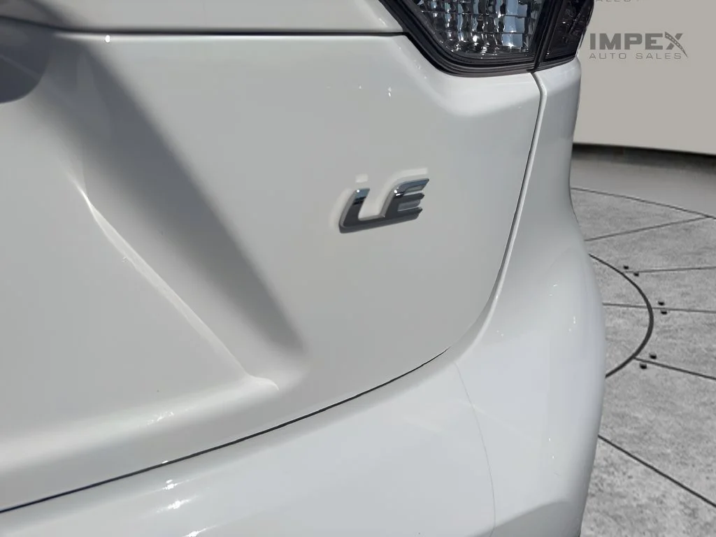 Used 2025 White Toyota LE image 25