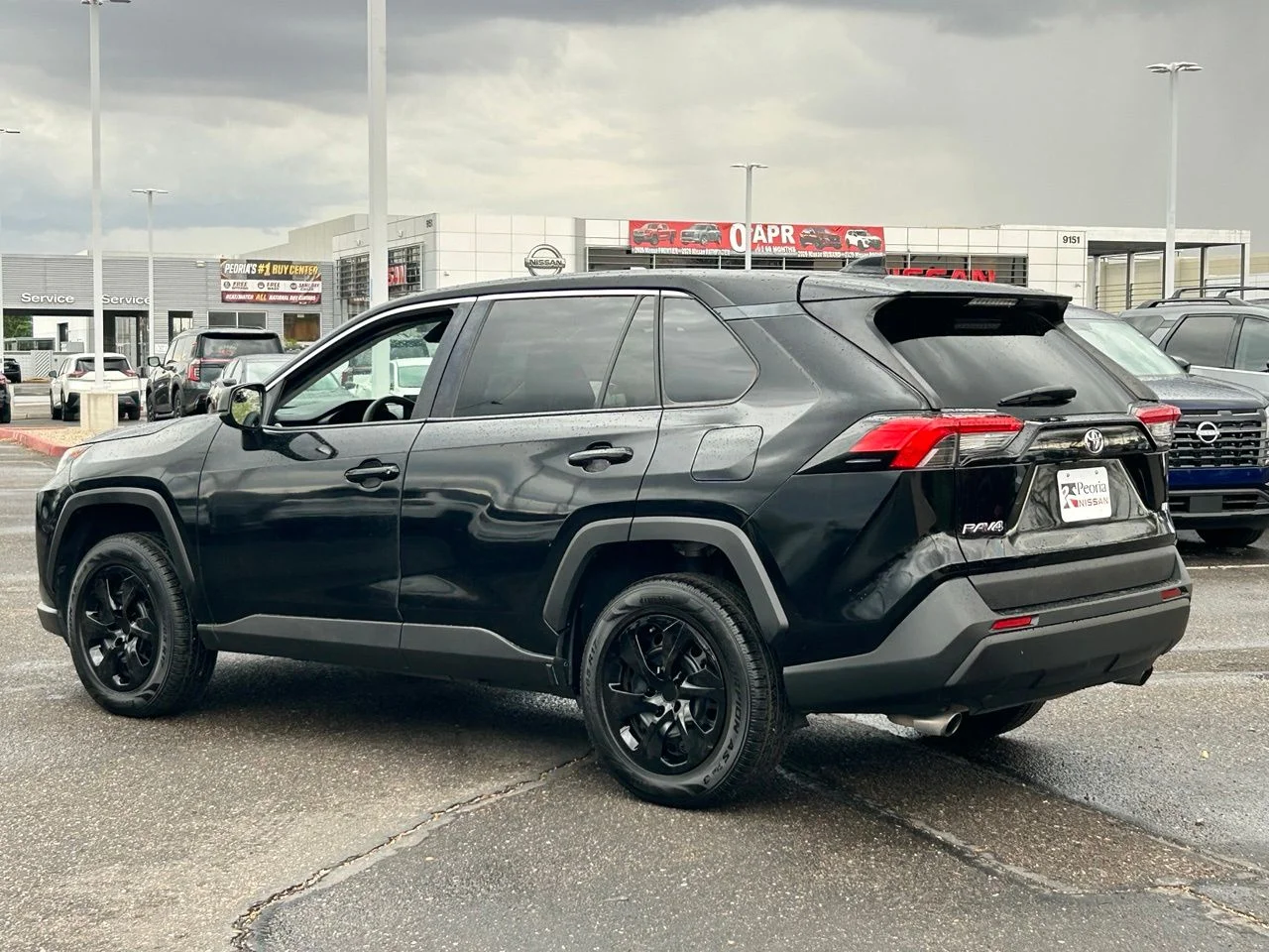 Used 2022 Midnight Black Metallic Toyota LE image 3