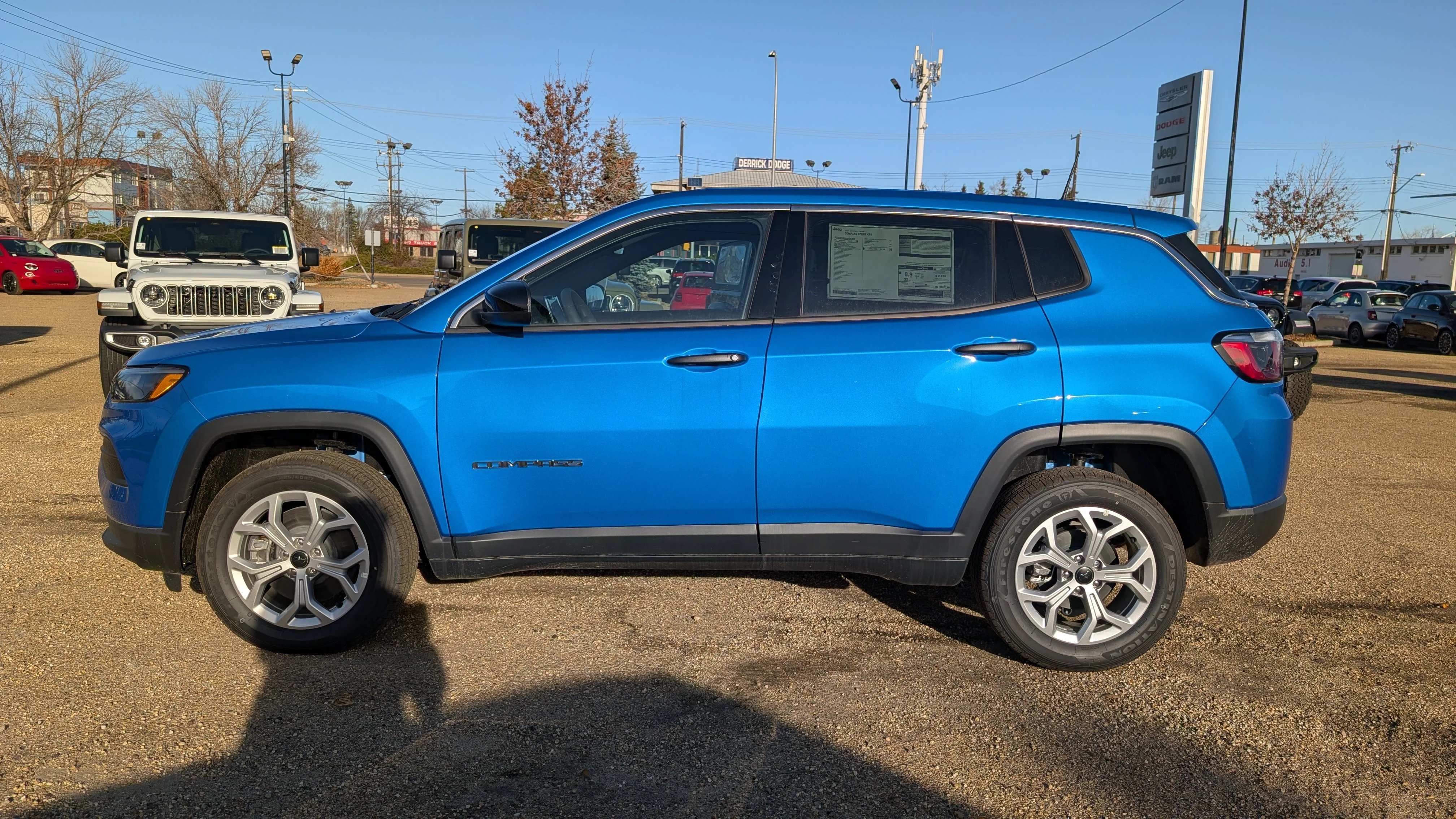 New 2026 Laser Blue Pearl Jeep Sport image 3