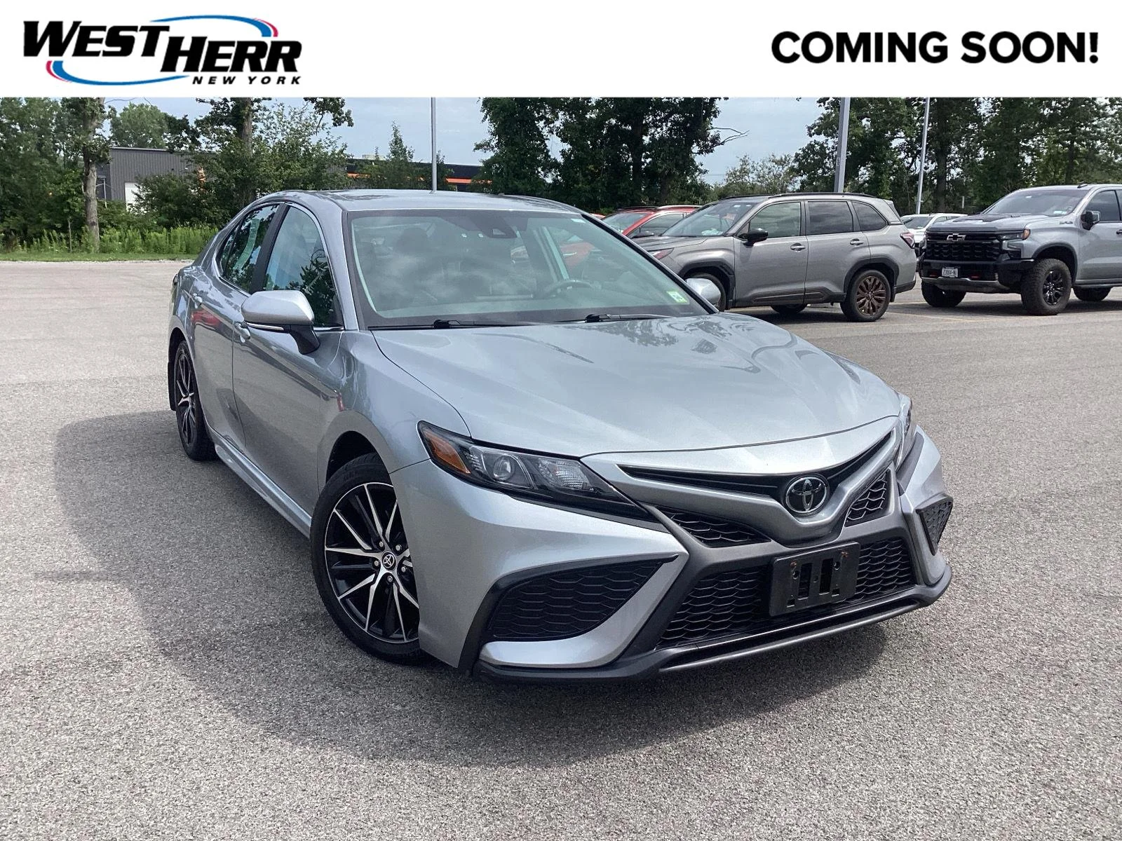 Used 2023 Celestial Silver Metallic Toyota SE image 1