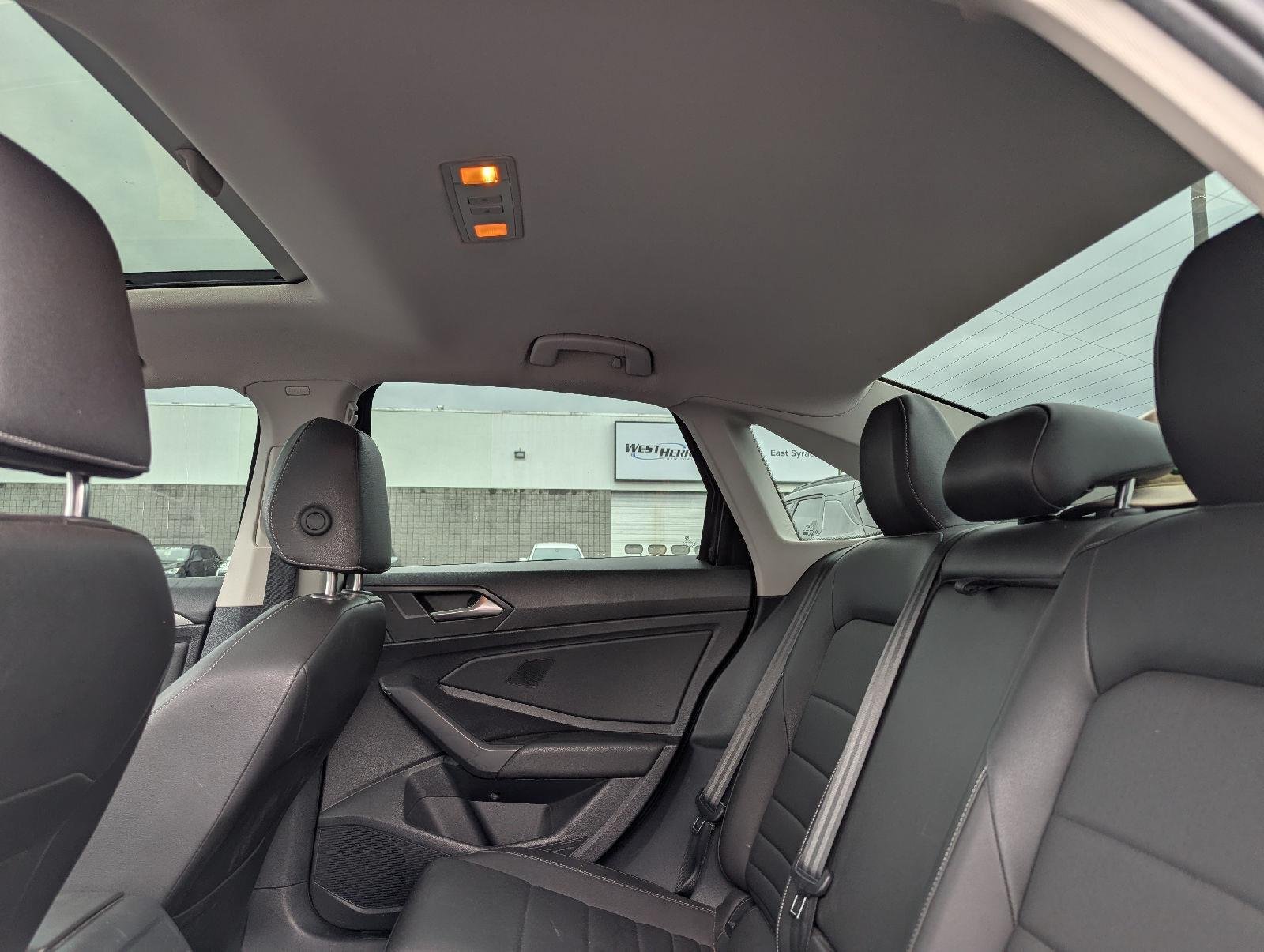 Used 2021 Black Uni Volkswagen SE image 11