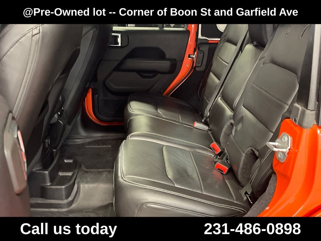 Used 2018 Orange Jeep Unlimited Sahara image 21
