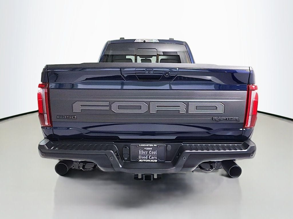 Used 2024 Antimatter Blue Metallic Ford Raptor 4WD SuperCrew 5.5