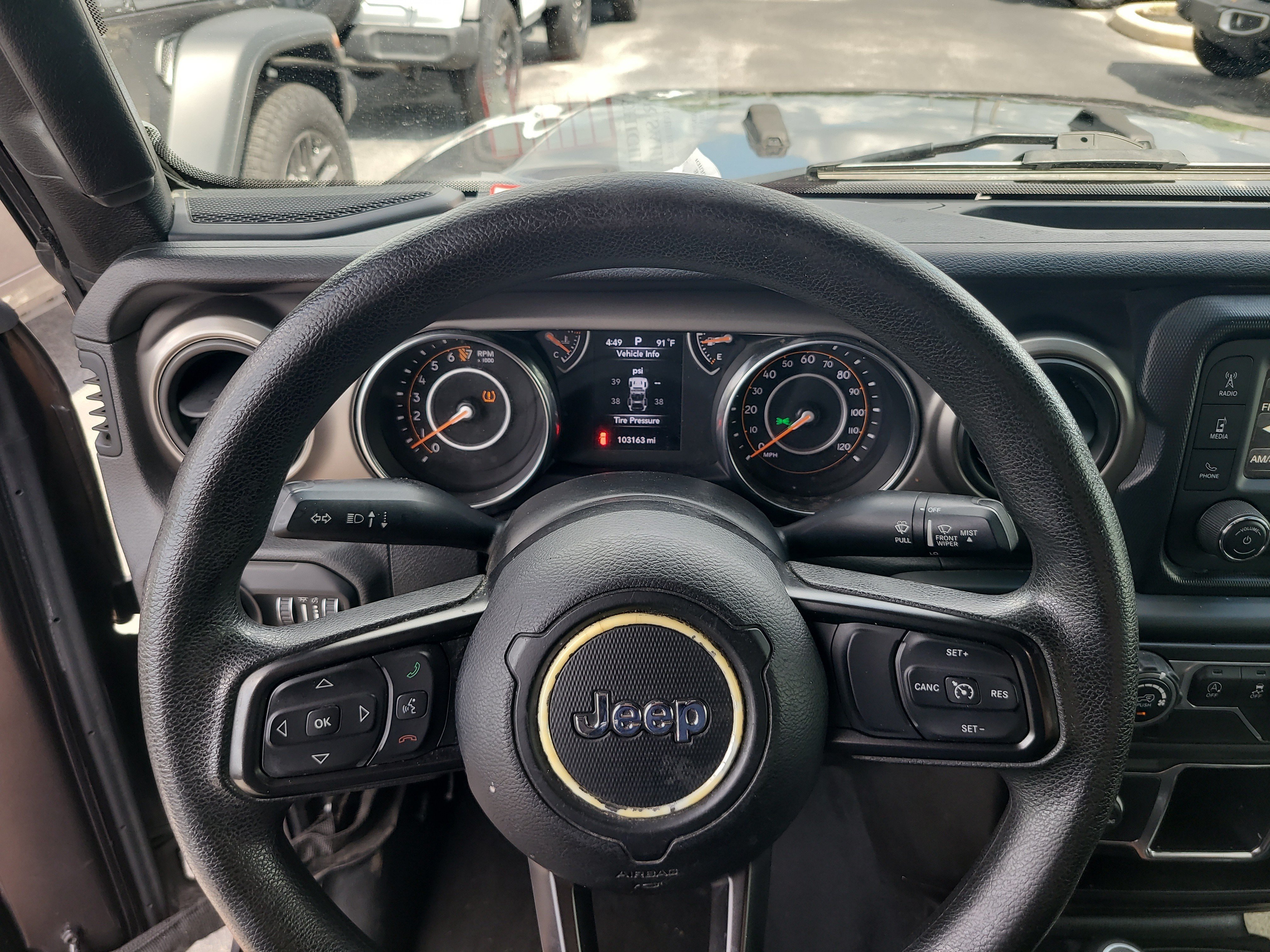 Used 2019 Granite Crystal Metallic Clearcoat Jeep Sport image 26