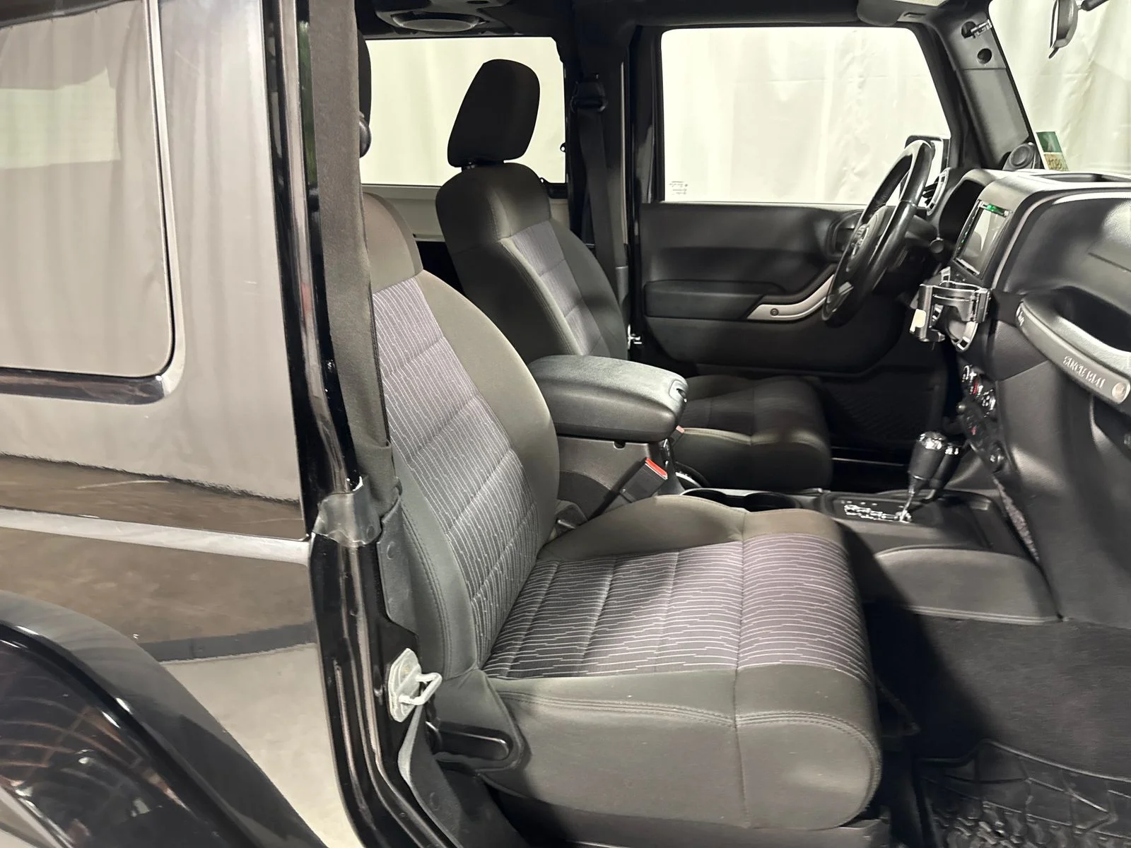Used 2012 Black Clearcoat Jeep Sahara image 26