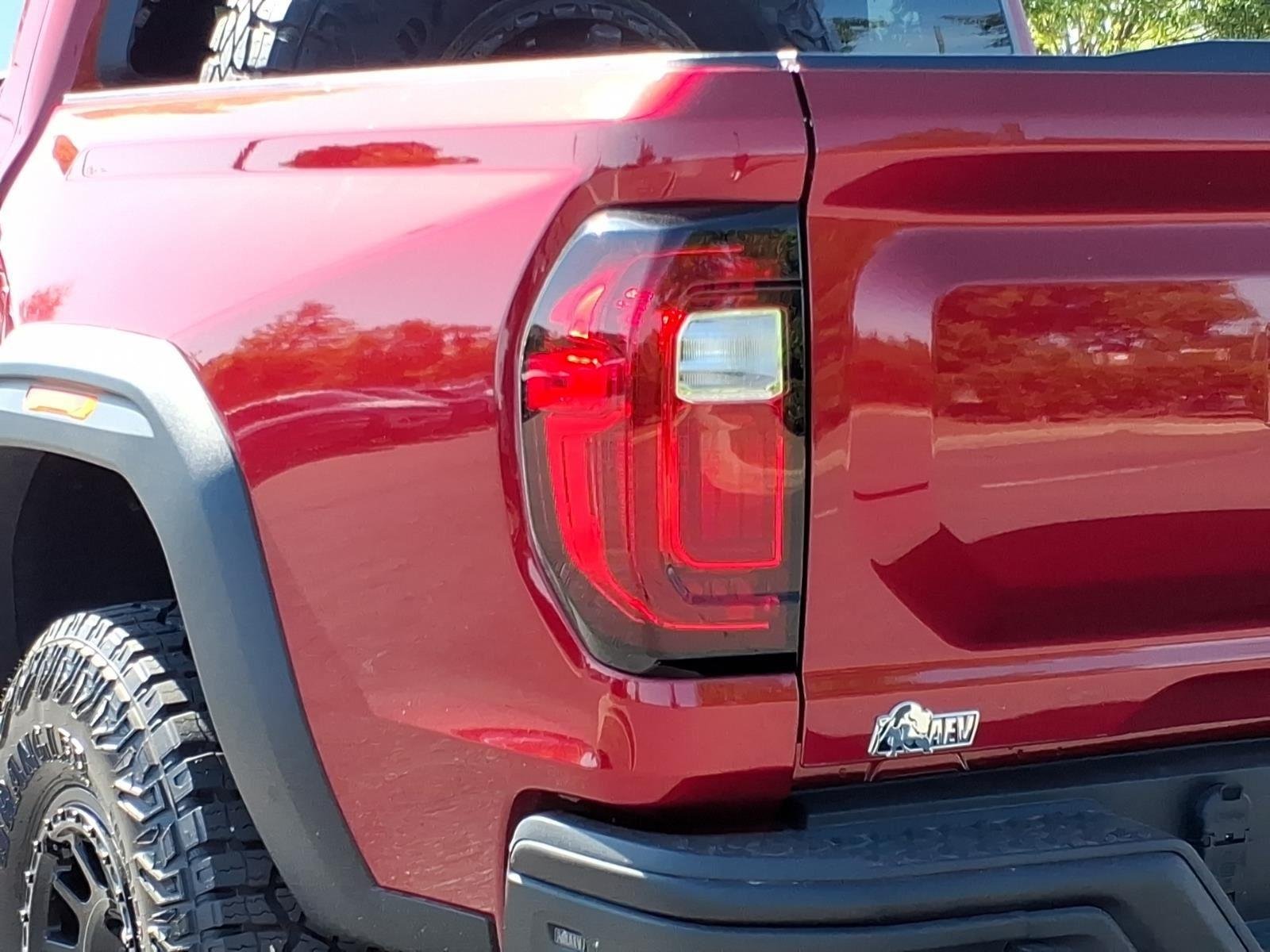 Used 2024 Volcanic Red Tintcoat GMC 4WD AT4X image 18