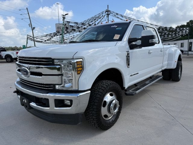 Used 2019 White Ford Lariat Crew Cab Long Bed DRW 4WD image 1