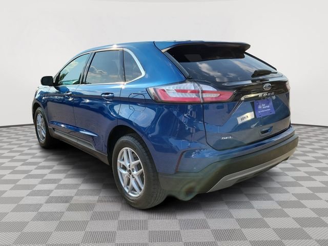 Certified Used 2024 Blue Metallic Ford SEL image 3