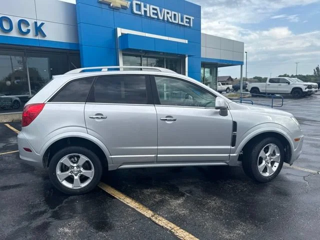 Used 2014 Chevrolet Captiva Sport LTZ with VIN 3GNAL4EK4ES650356 for sale in Woodstock, IL