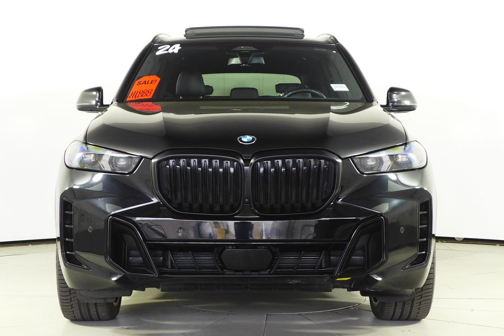 Used 2024 Black Sapphire Metallic BMW sDrive40i image 3