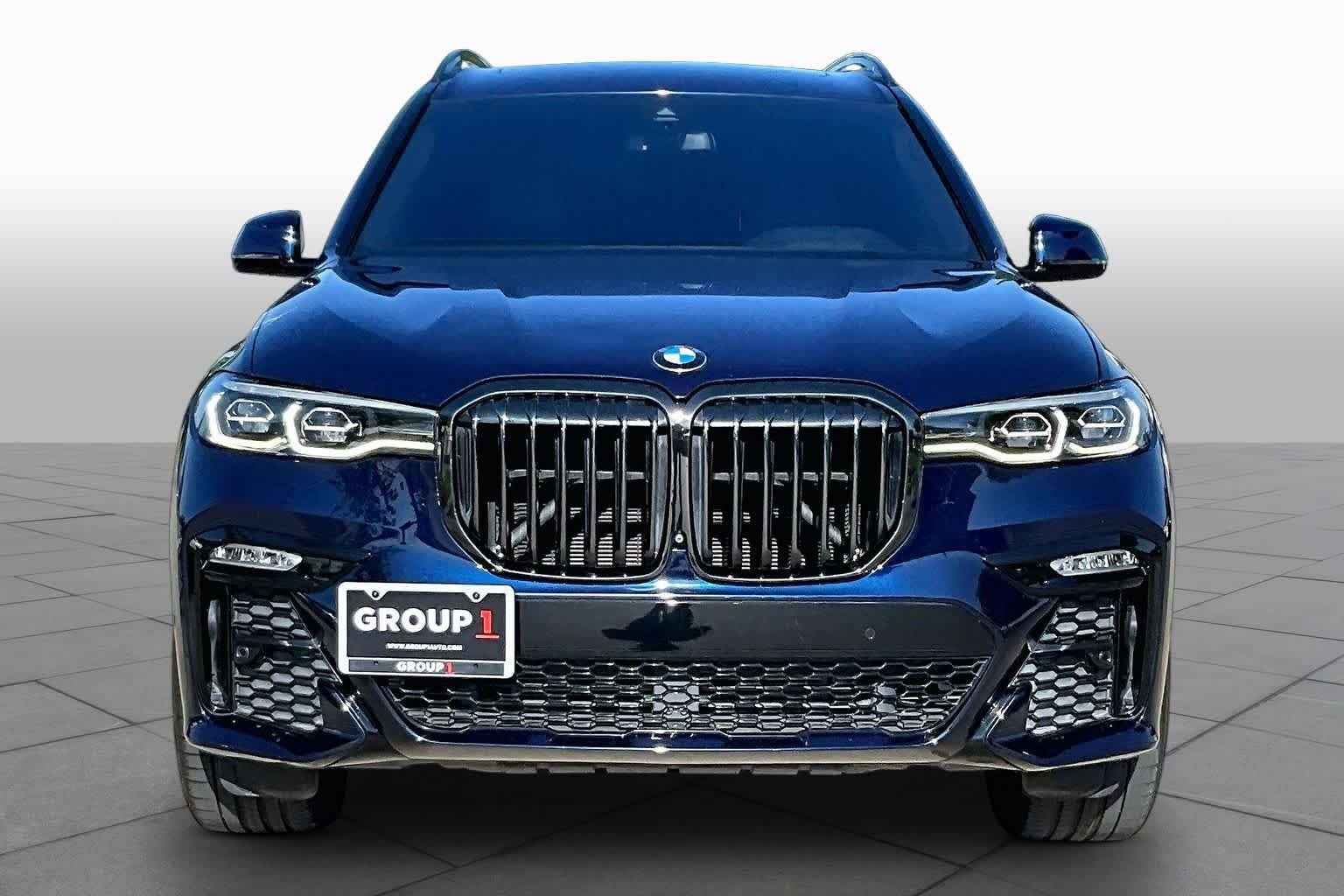Used 2022 Tanzanite Blue II Metallic BMW xDrive40i image 4