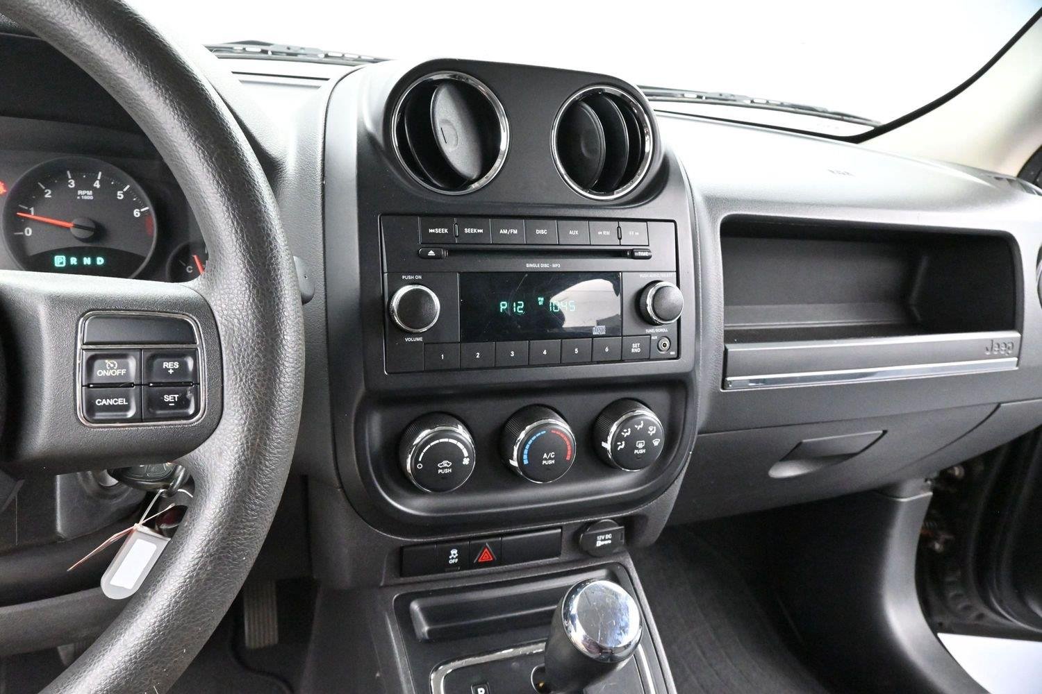 Used 2011 Brilliant Black Crystal Pearl Jeep Sport image 17