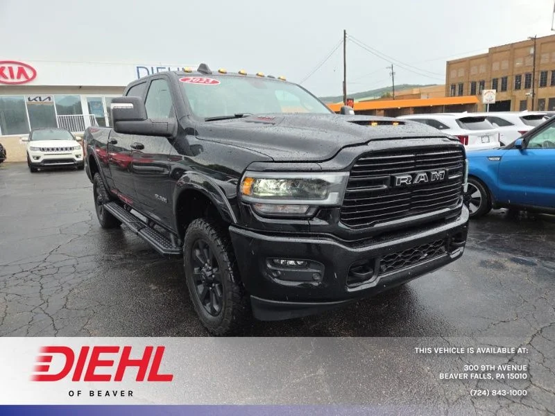 Used 2023 Diamond Black Ram Laramie image 1