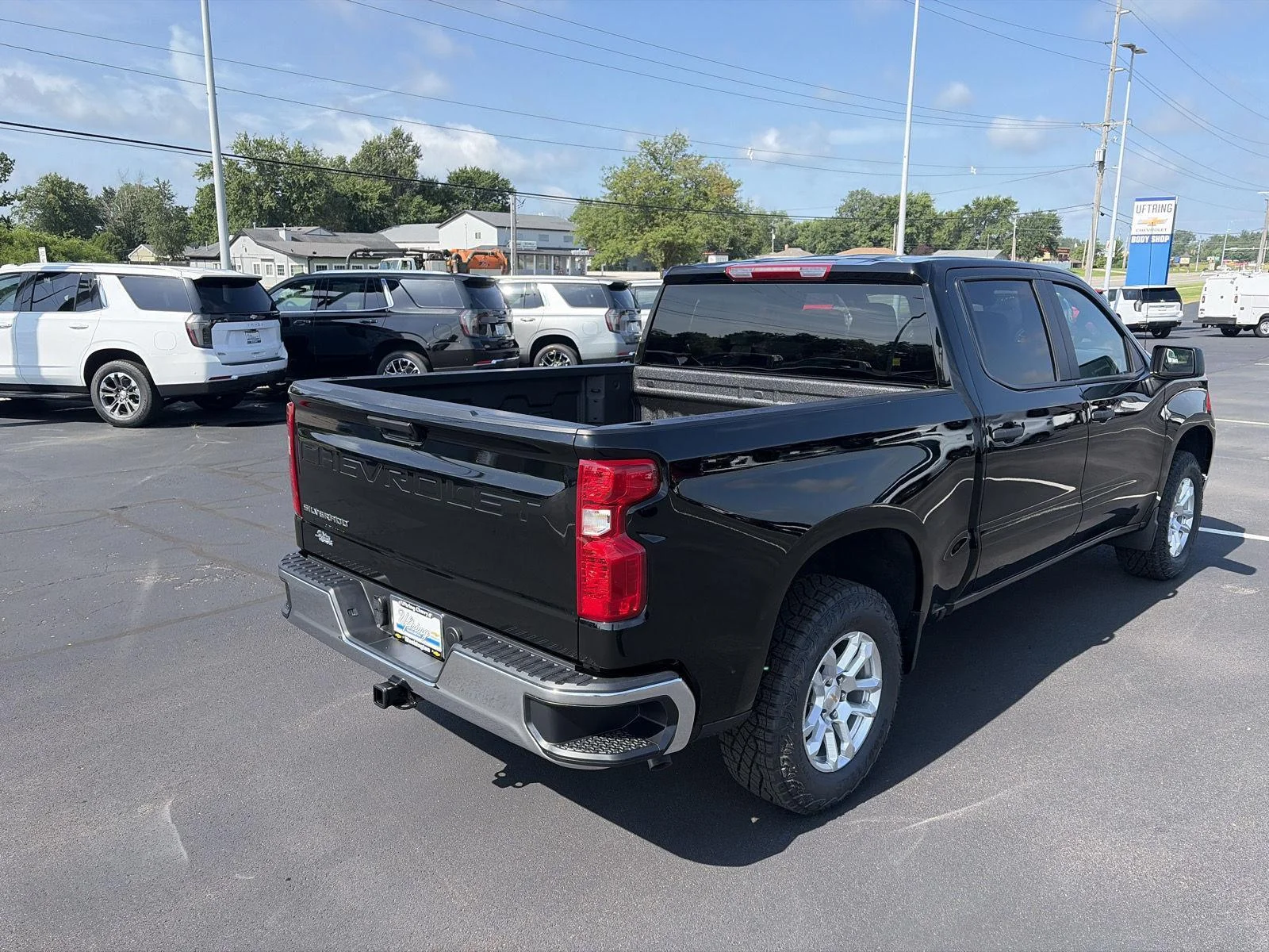 New 2026 Black Chevrolet Work Truck image 3