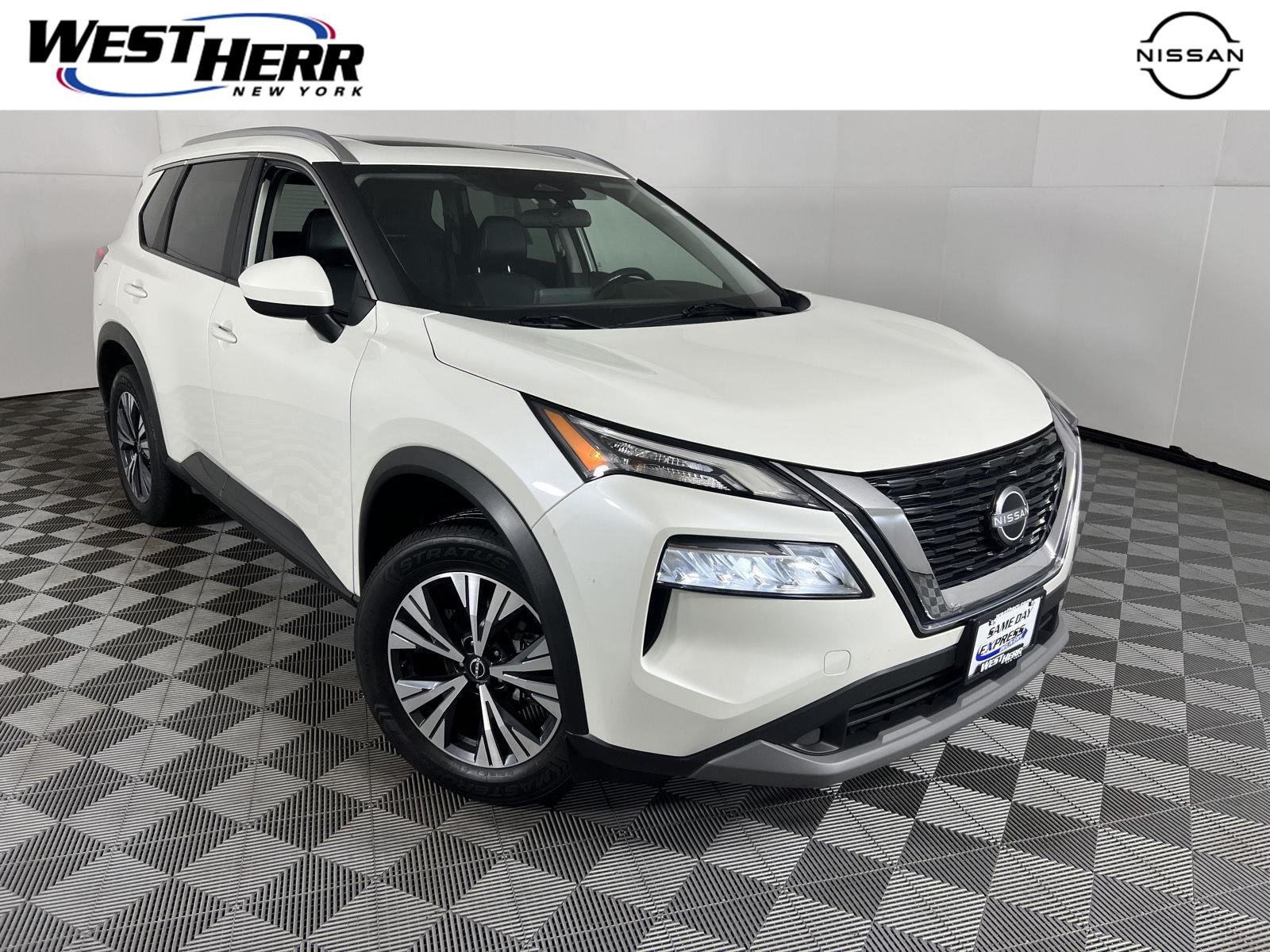 Used 2023 Pearl White Tricoat Nissan SV image 1