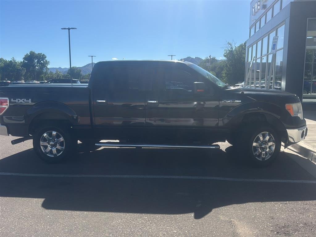 Used 2013 Tuxedo Black Metallic Ford XLT image 4