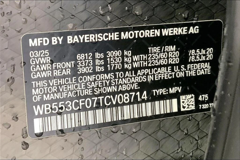 Used 2026 Black Sapphire Metallic BMW xDrive60 image 10