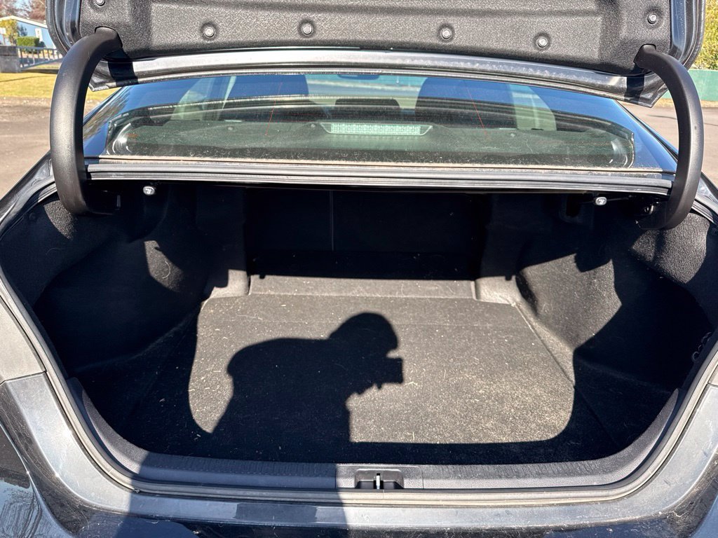 Used 2021 Midnight Black Metallic Toyota LE image 19