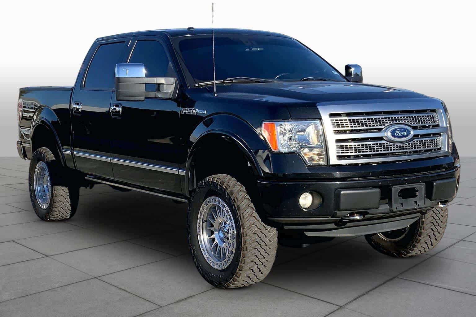 Used 2011 Tuxedo Black Metallic Ford Platinum image 2
