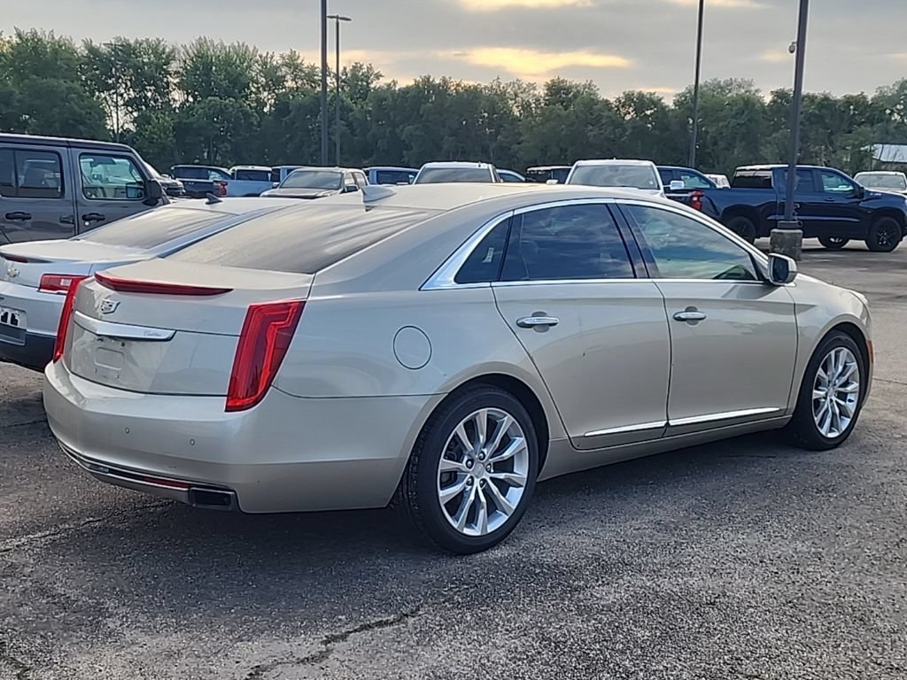 Used 2016 SILVER COAST METALLIC Cadillac Luxury Collection image 2
