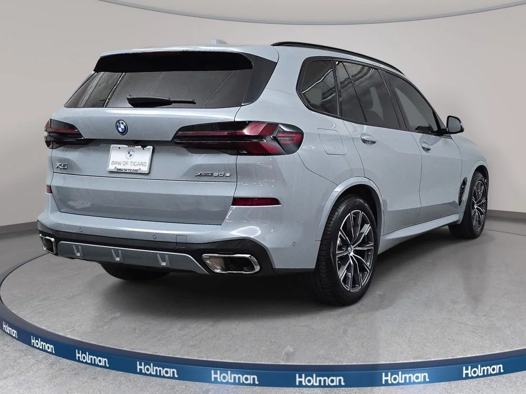 Used 2024 Brooklyn Gray Metallic BMW xDrive50e image 5