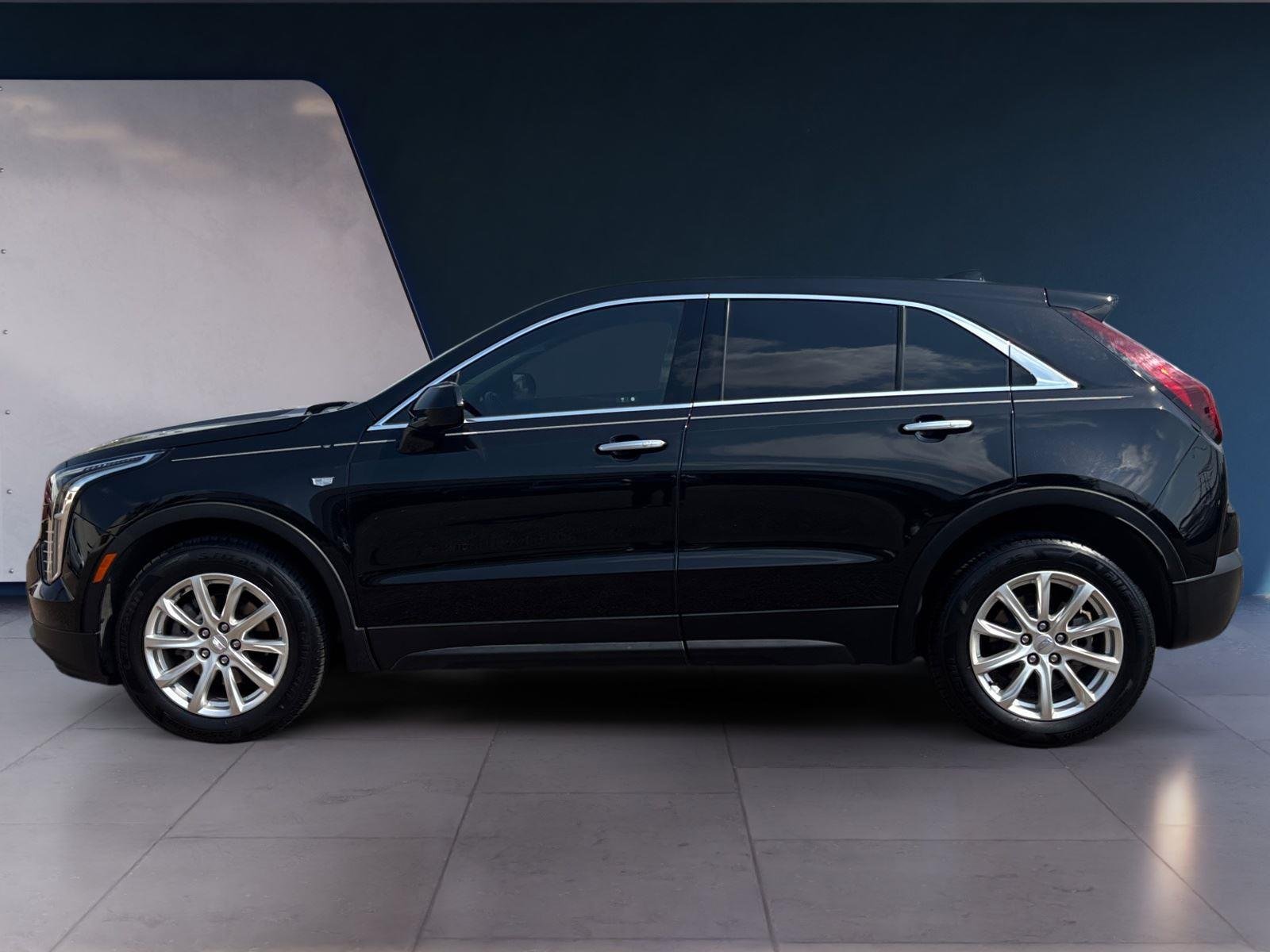 Used 2023 Stellar Black Metallic Cadillac FWD Luxury image 2