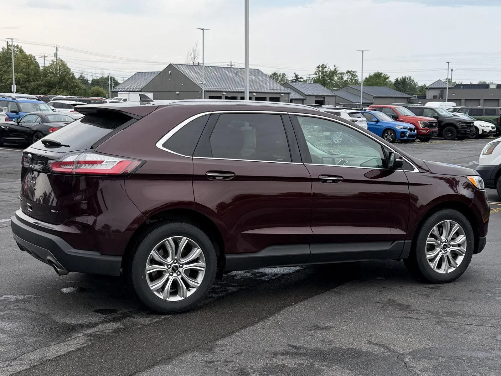 Used 2024 Burgundy Velvet Metallic Tinted Clearcoat Ford Titanium image 6