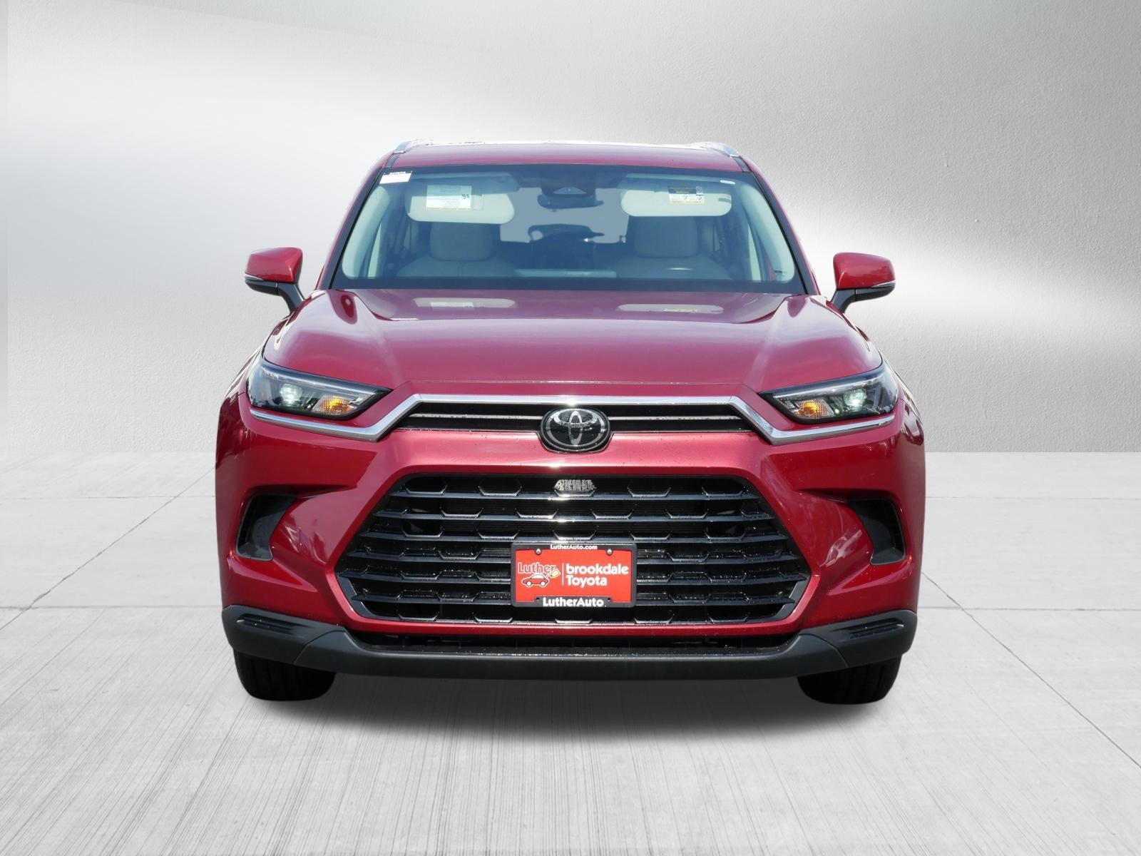 Used 2024 Toyota Grand Highlander XLE with VIN 5TDAAAB52RS059710 for sale in Brooklyn Center, Minnesota