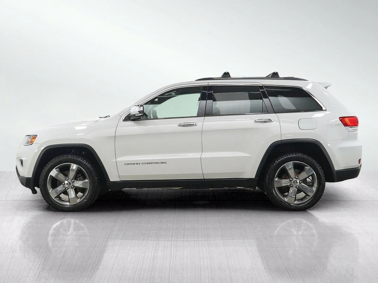 Used 2015 Jeep Grand Cherokee Limited with VIN 1C4RJFBG1FC909597 for sale in Wayzata, Minnesota