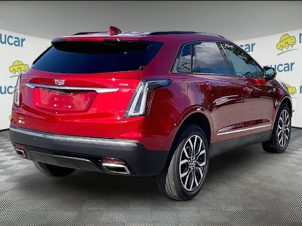 Used 2024 Radiant Red Tintcoat Cadillac Sport image 6