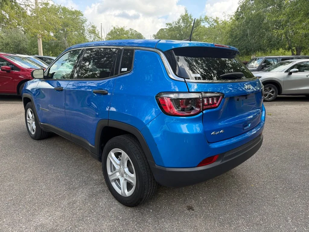 Used 2023 Laser Blue Jeep Sport image 4