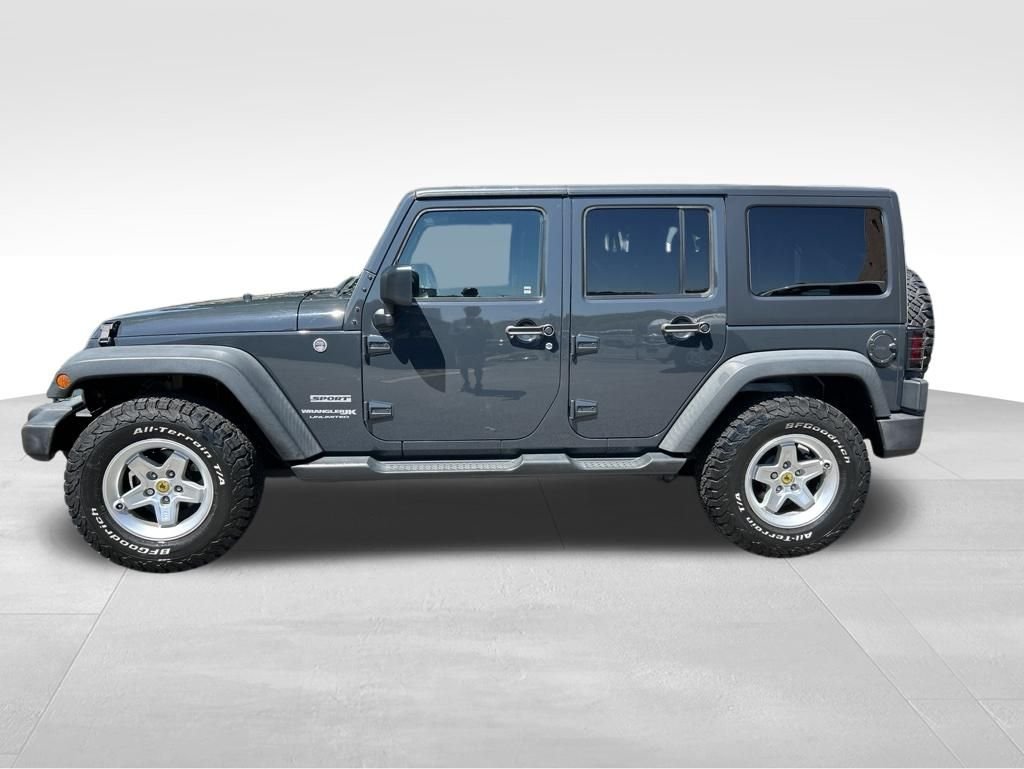Used 2018 Gray Jeep Unlimited Sport image 2