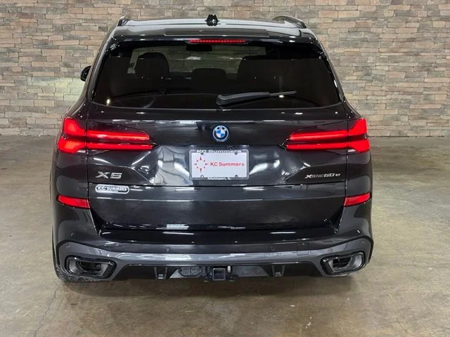 Used 2025 Black Sapphire Metallic BMW xDrive50e image 7