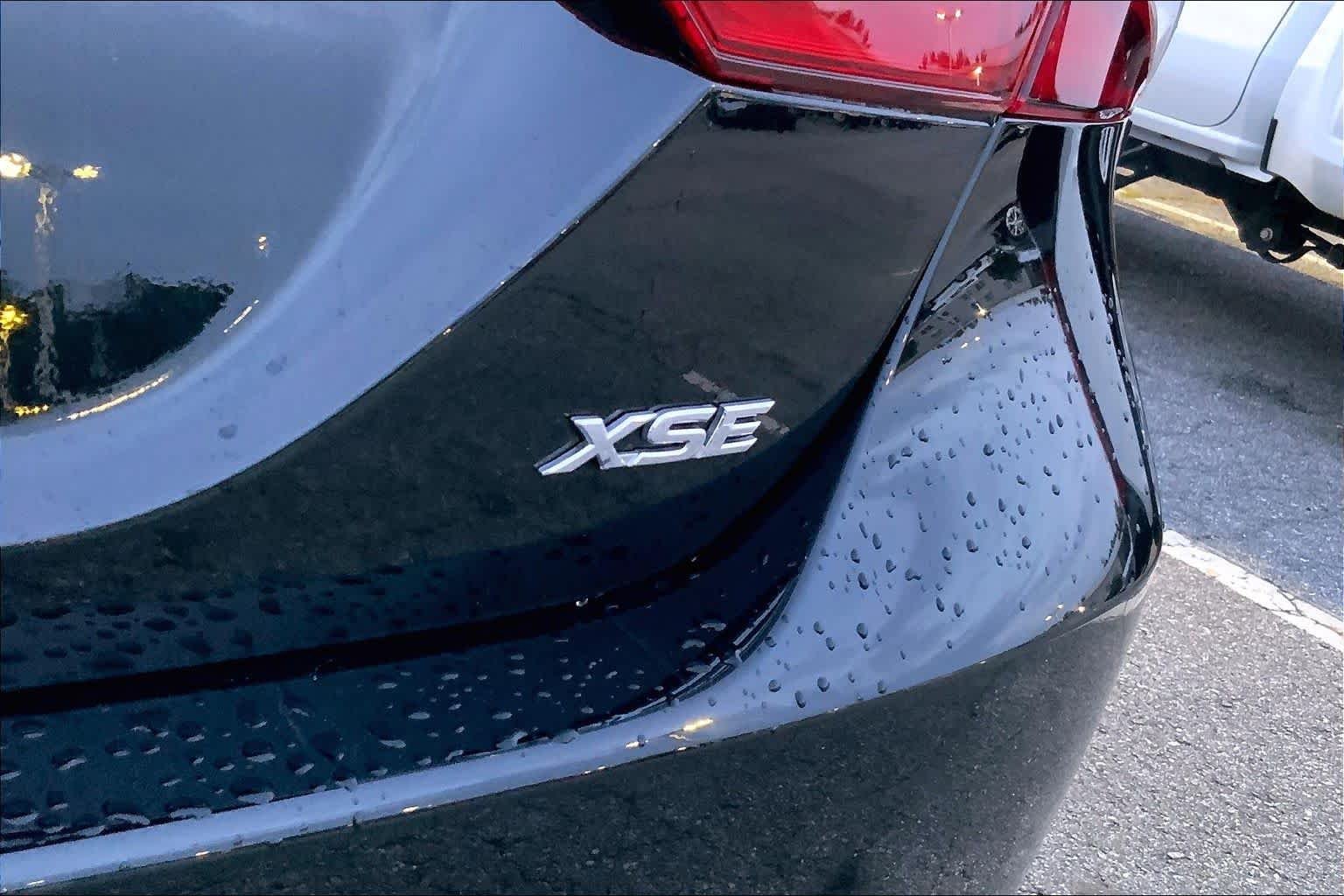 Used 2022 Midnight Black Metallic Toyota XSE image 9