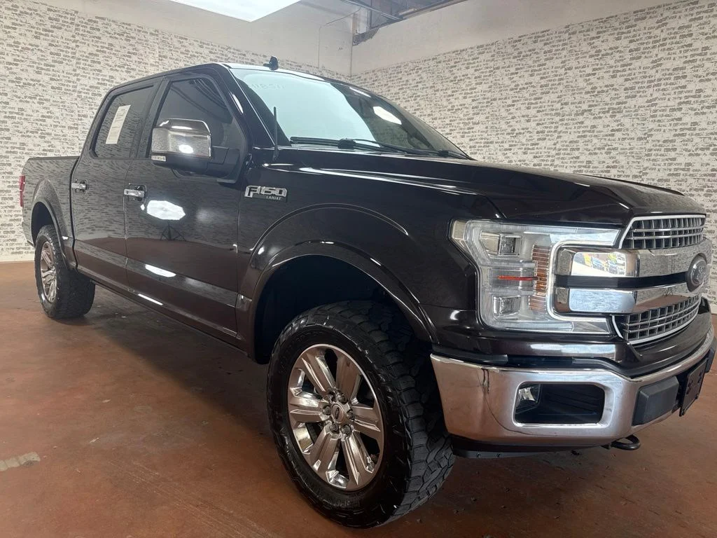 Used 2018 Magma Red Metallic Ford Lariat image 1