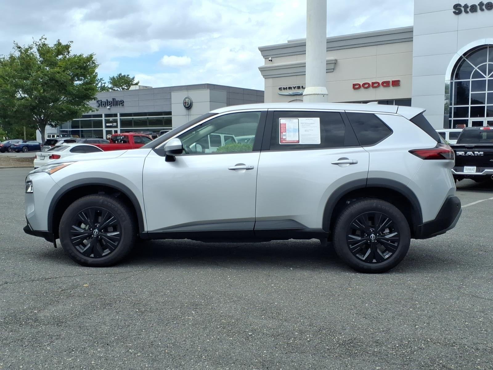 Used 2023 Brilliant Silver Metallic Nissan SV image 3