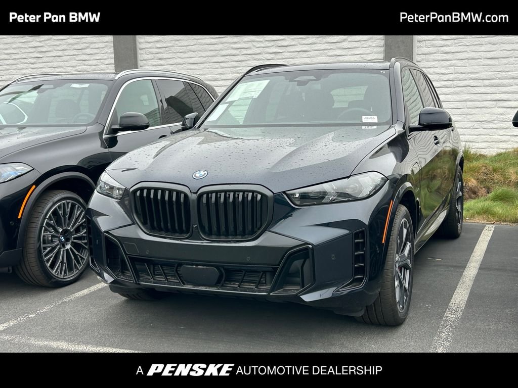 New 2026 Carbon Black Metallic BMW xDrive50e image 1