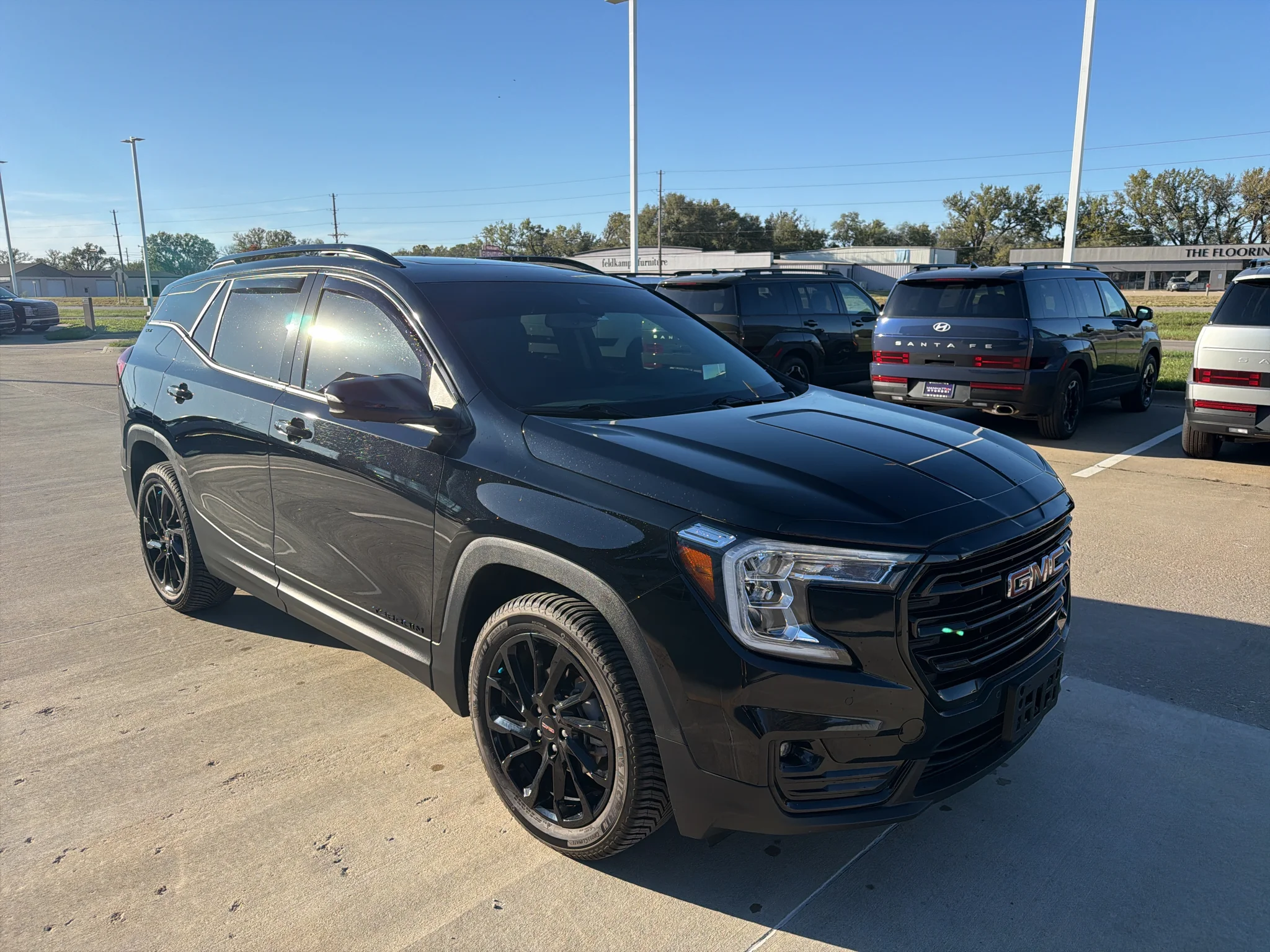 Used 2023 Ebony Twilight Metallic GMC SLT image 9