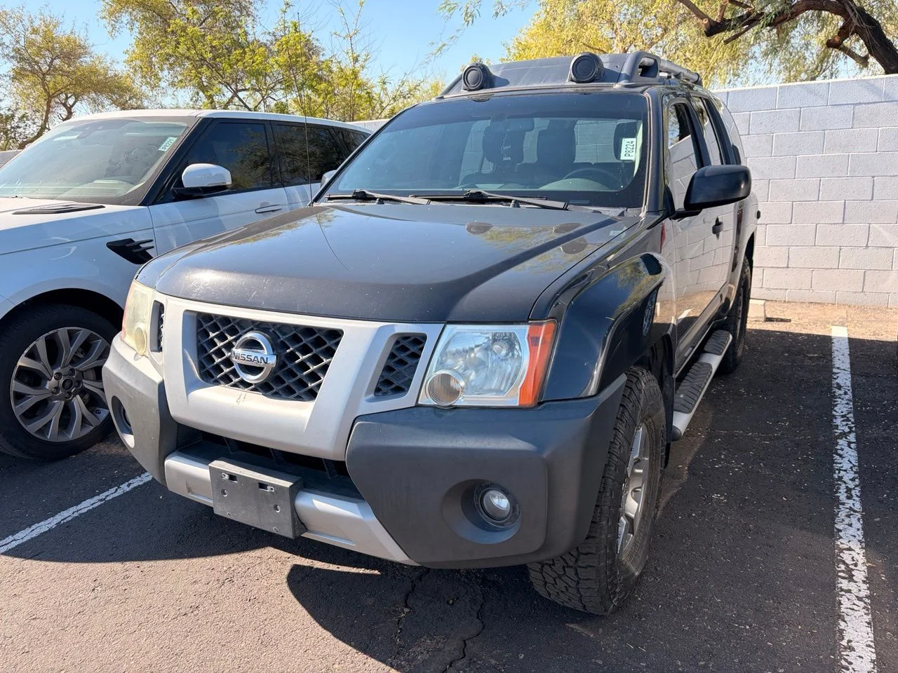 Used 2013 Night Armor Pearl Mica Nissan PRO-4X image 2